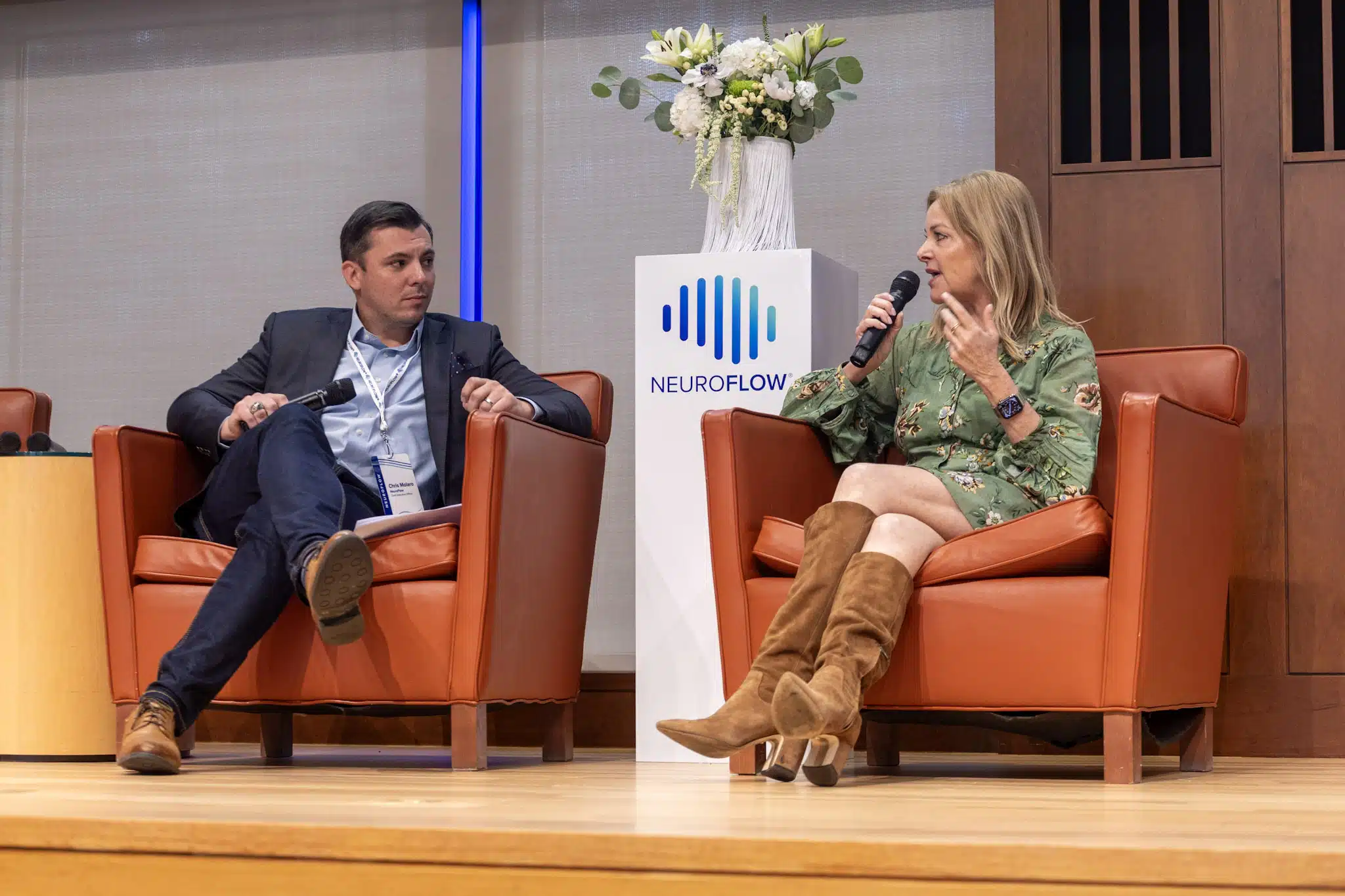Chris Molaro and Marjorie Morrison speaking on a panel.